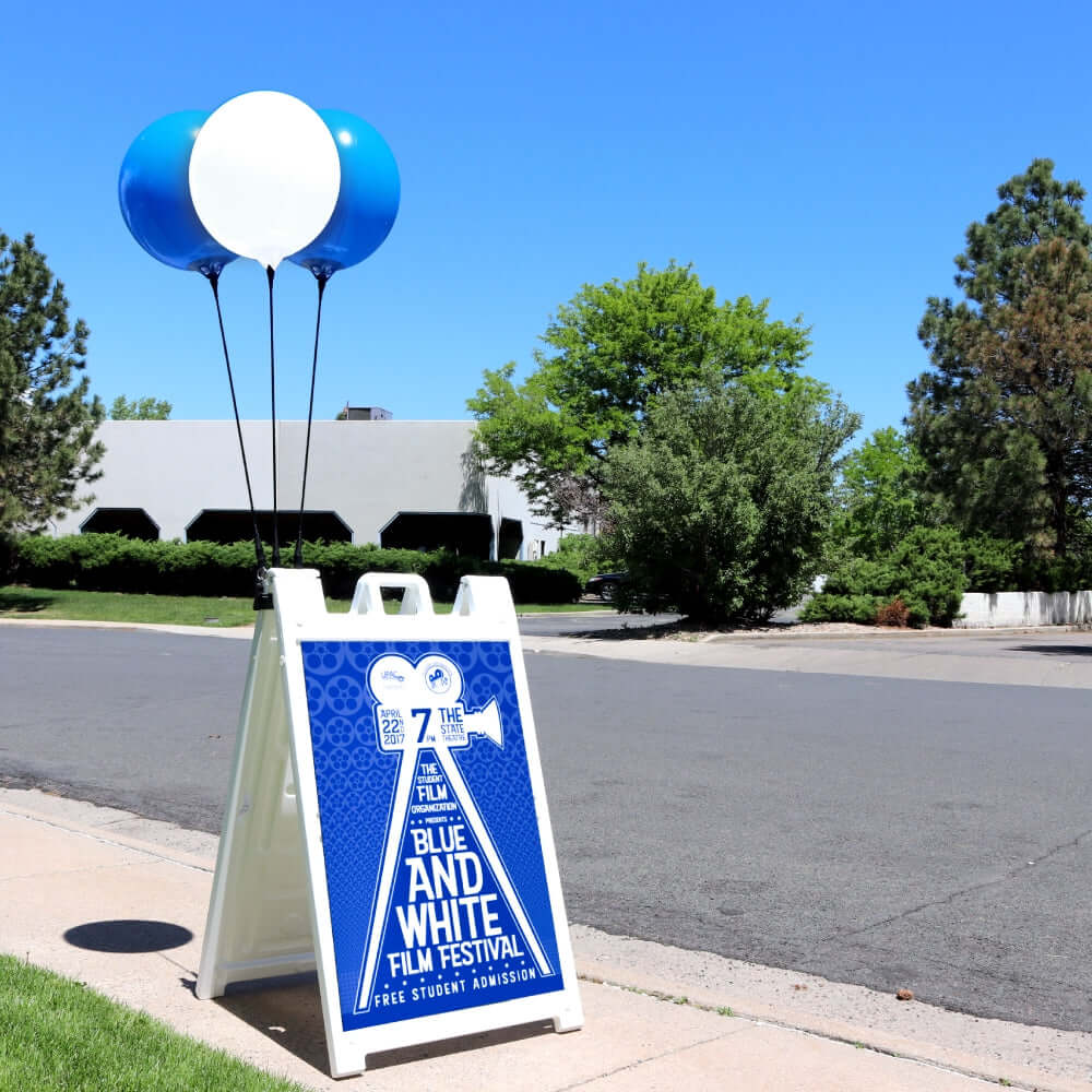 Bobber balloon displayed on an A-frame sign, ideal for attracting attention at events, promotions, or storefronts. The bright, eye-catching balloon adds an extra layer of visibility and excitement, creating a fun and effective way to draw in customers. Perfect for outdoor displays.