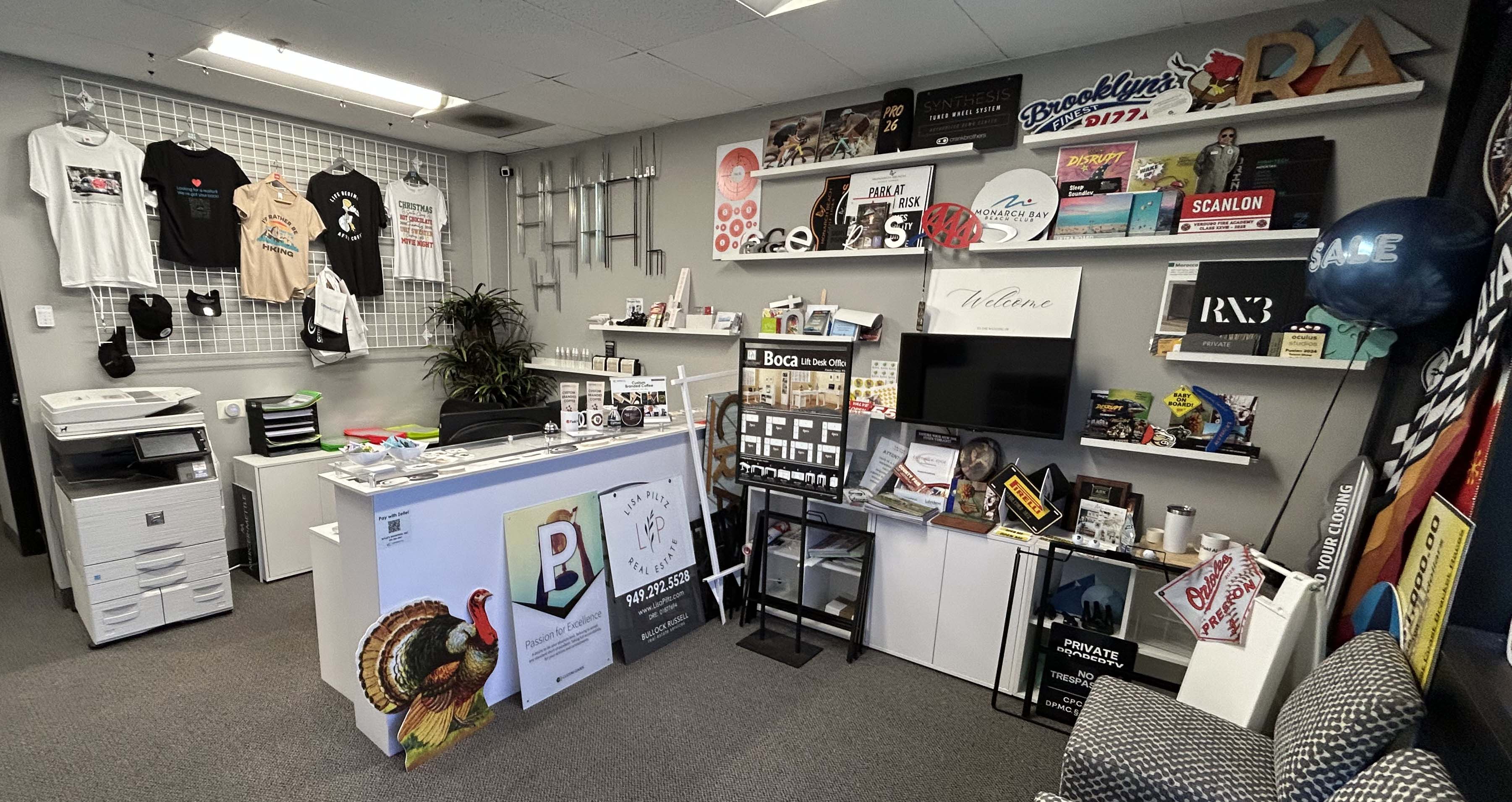 Picture of a demo wall showcasing Cutting Edge Print Shop's high-quality printing capabilities. Featuring vibrant prints, materials, and custom designs, this demo wall highlights the professional and diverse services offered by the print shop for various business and personal projects.