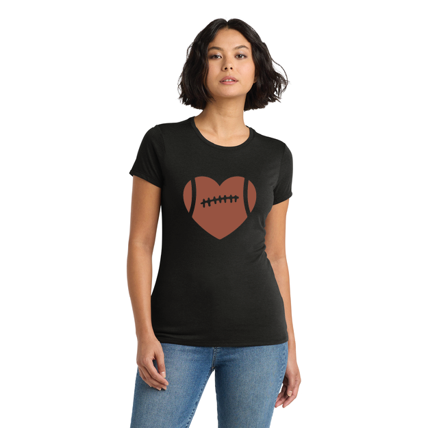 Woman wearing a black t-shirt with a heart-shaped football design on a white background