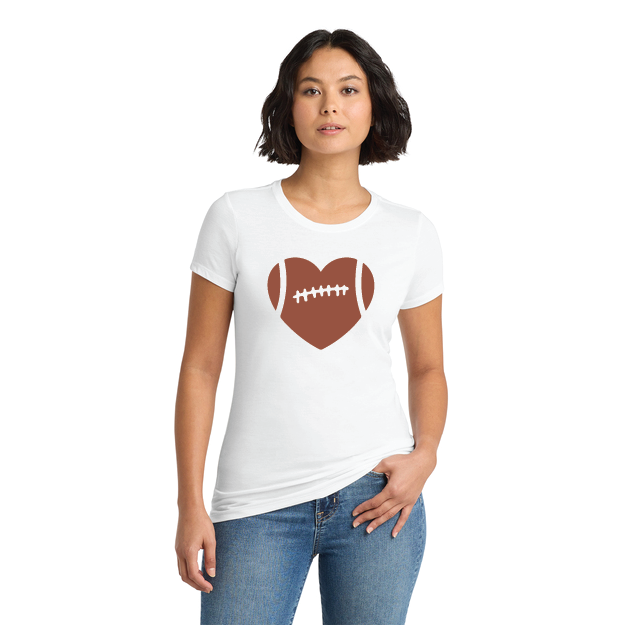 Woman wearing a white t-shirt with a brown heart and football design on a white background