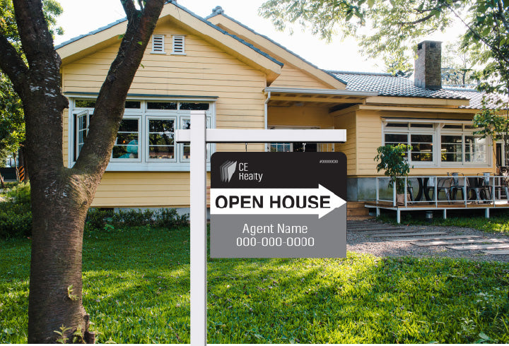 Realtor sign displayed in a front yard, showcasing a property listing. Durable, weather-resistant sign designed for outdoor use, ideal for attracting attention and promoting real estate listings in residential areas.