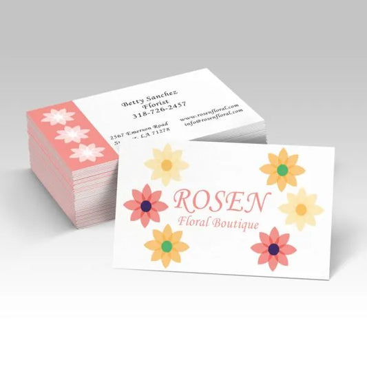 Stack of business cards with floral design and 'Rosen Floral Boutique' branding on a white background.