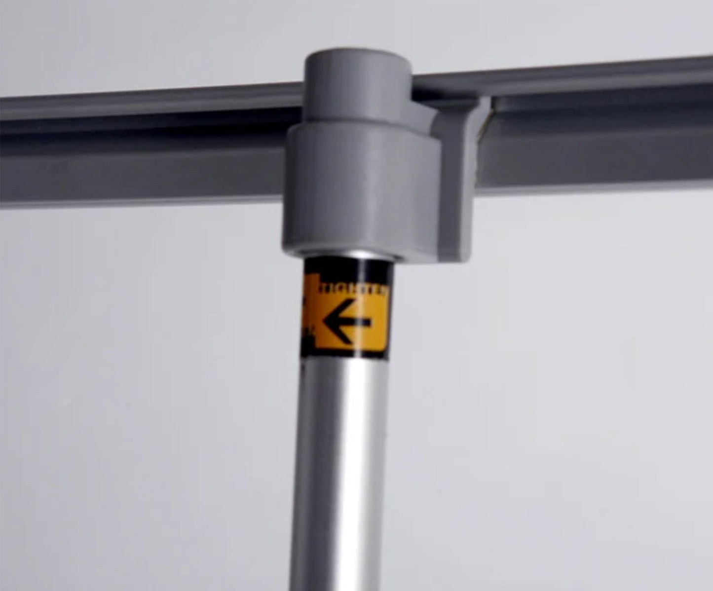 Photo of the top of the HD banner stand, designed to securely hold retractable banners for optimal visibility. Perfect for trade shows, events, and promotions, ensuring a professional and stable display with high-quality graphics.