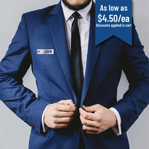 man in suit with name badge