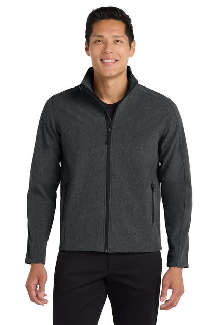Man wearing a gray jacket on a white background