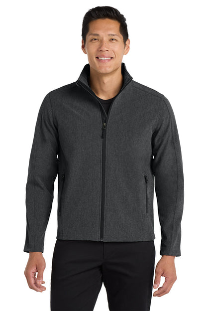 Man wearing a gray jacket on a white background