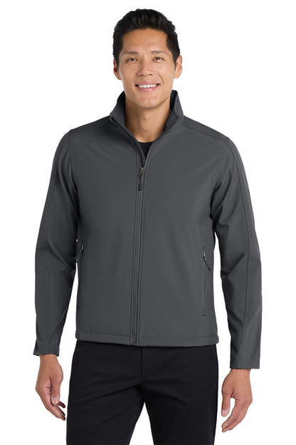 Man wearing a gray jacket on a white background