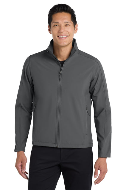 Man wearing a gray jacket on a white background