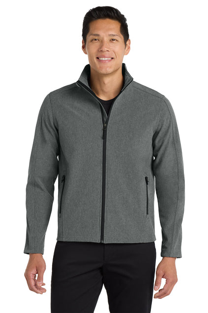 Man wearing a gray jacket on a white background