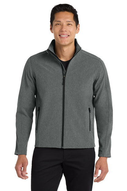 Man wearing a gray jacket on a white background