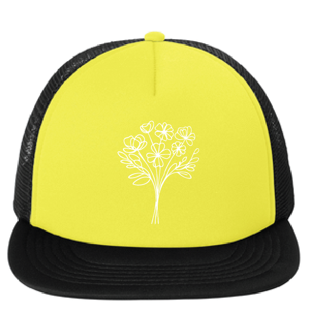 Yellow and black cap with a white floral design on a white background