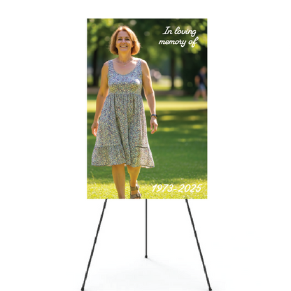 Memorial poster with a woman in a dress standing outdoors, with text 'In loving memory of' and years '1973-2025'.