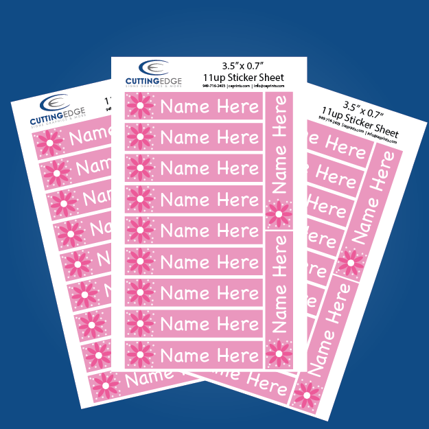 Sheet of personalized name labels with floral design on a blue background