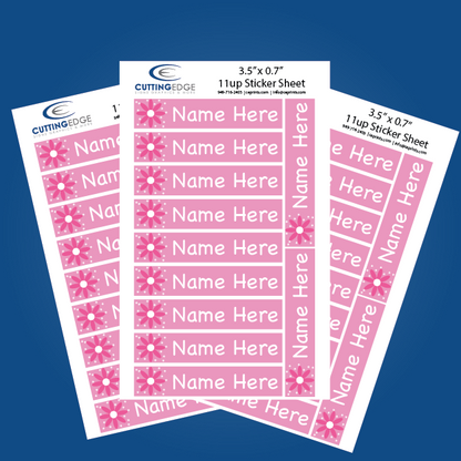 Sheet of personalized name labels with floral design on a blue background