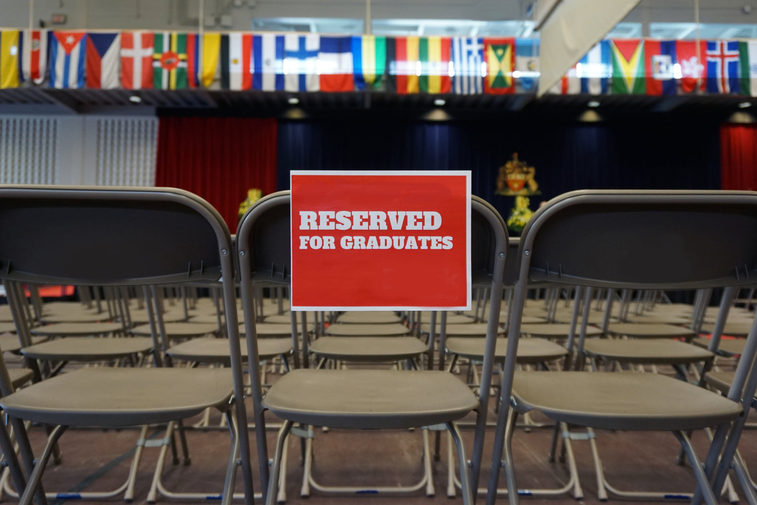 reserved for grad sign on chair