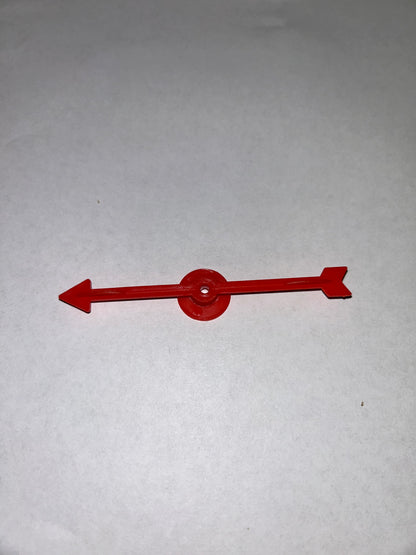 A collection of colorful plastic arrow spinners with a circular base, designed for use in board games and tabletop RPGs.