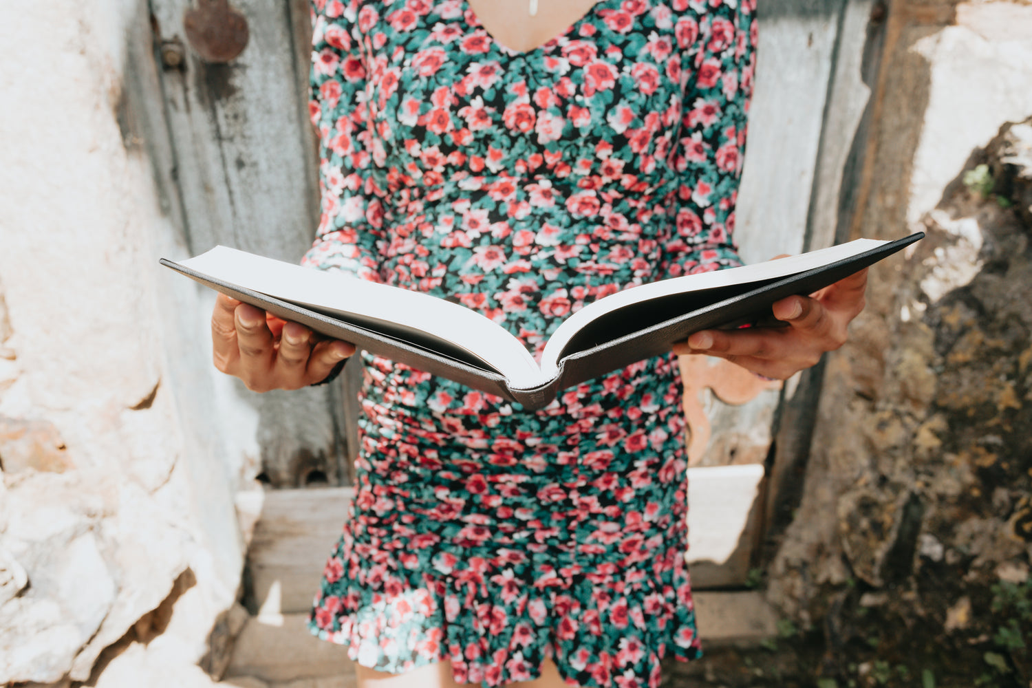 lady holding wedding book